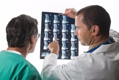 The doctor looks like photos of the spine